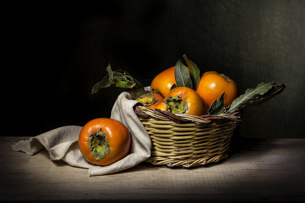 Cesto di cachi von Adriana Vitale