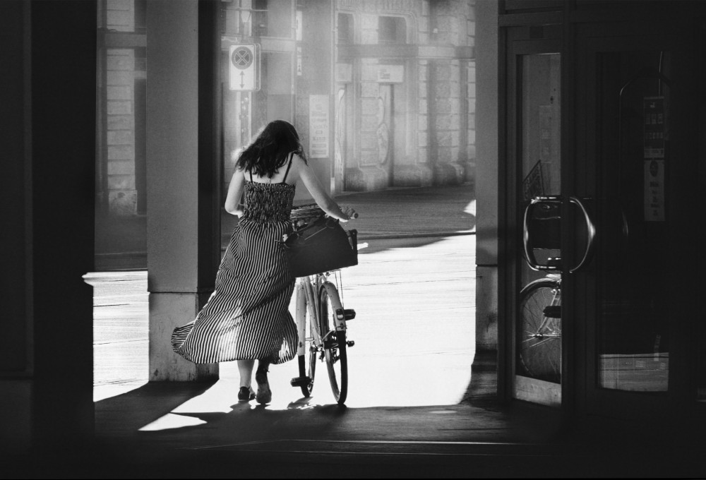 Woman with the bicycle von Alexander Jikharev