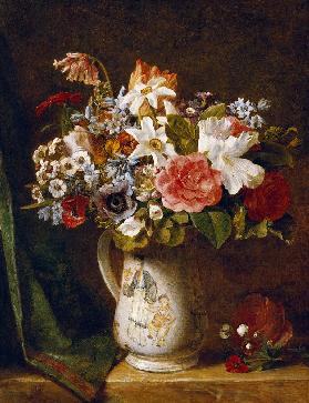 Rosen, Osterglocken und andere Blumen in einer Vase
