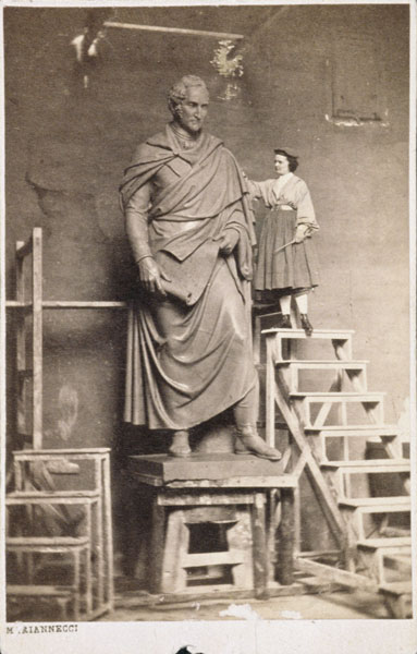 Harriet Hosmer on ladder with her sculpture of Thomas Hart Benton von American Photographer