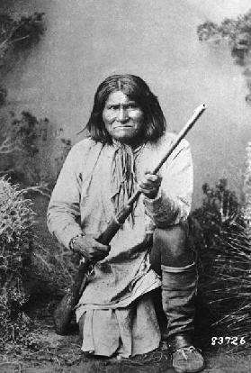 Geronimo holding a rifle