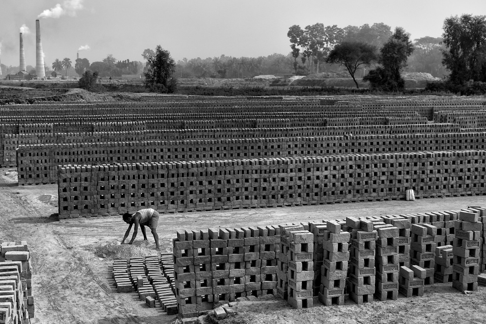 Working alone in Brick field von Avishek Das