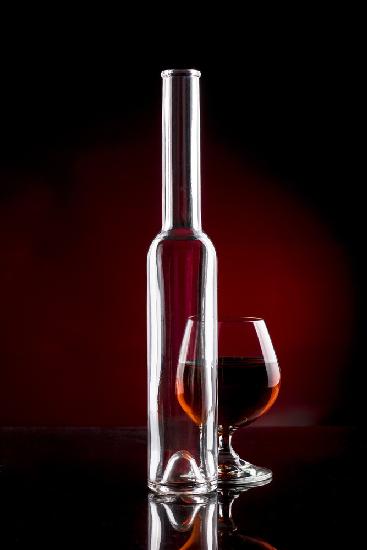 Still life with a glass bottle