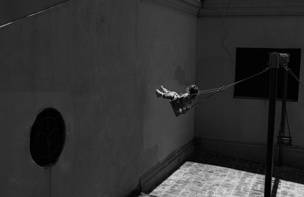 Swing against the wall (from the series "Childhoods") von Dieter Matthes