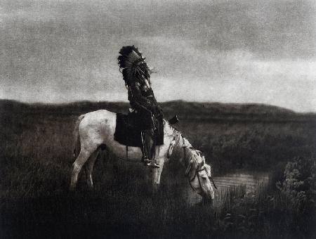 Indian warrior riding in the plain, 20th century