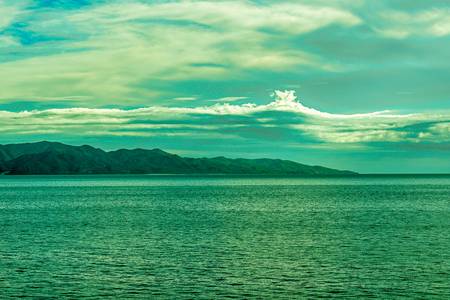 Design featuring a vibrant sky and mountains. 