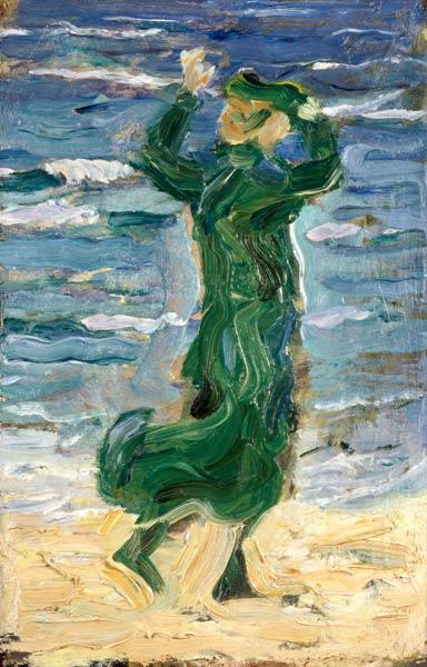 Frau im Wind am Meer