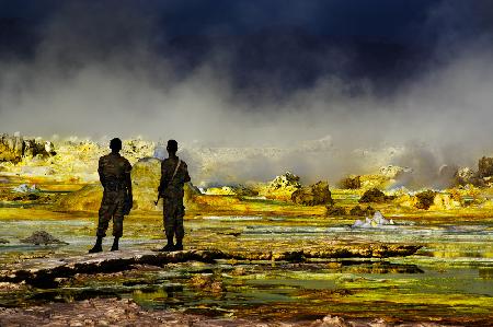 Two soldiers observing a Volcano