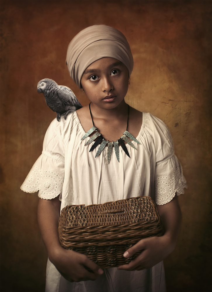 She and her little parrot von Hari Sulistiawan