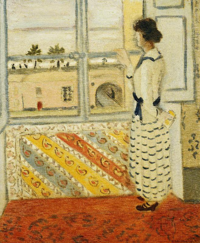 Young woman in a blue striped dress at a window von Henri Matisse