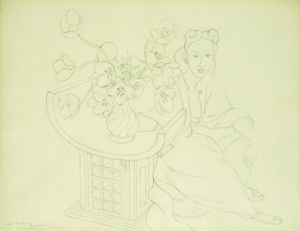 Seated Woman with a Vase of Tulips von Henri Matisse