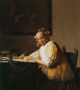 Eine Dame schreibt einen Brief