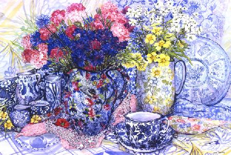 Cornflowers with Antique Jugs and Patterned Fabrics