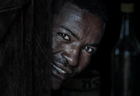 Ethiopian man and the beer bottle.