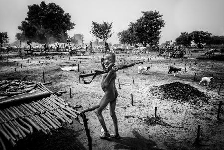 Imitating their elders - Mundari camp-South Sudan