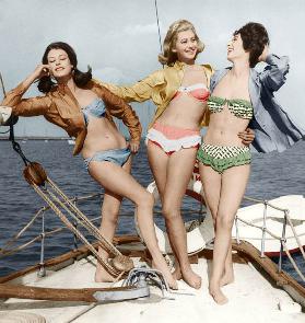 Three young women wearing bikinis colourized document