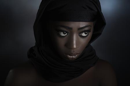 The black scarf.  (The trilogy of scarves: red, turquoise and black).