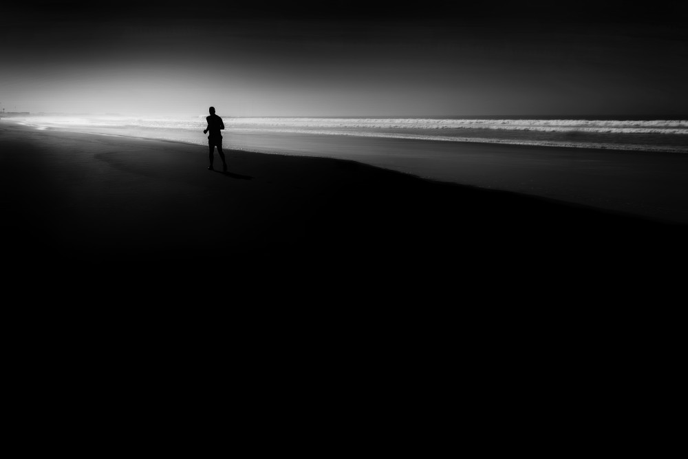 lonely walker at the beach von Roswitha Schleicher-Schwarz