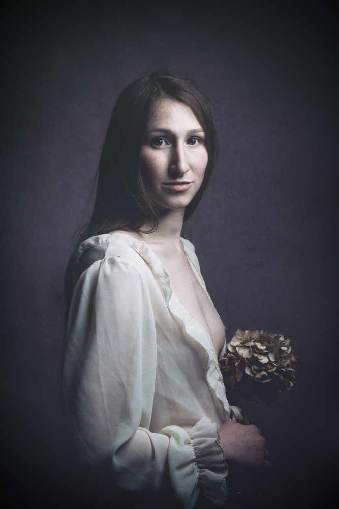 woman with flower von Ruth Franke