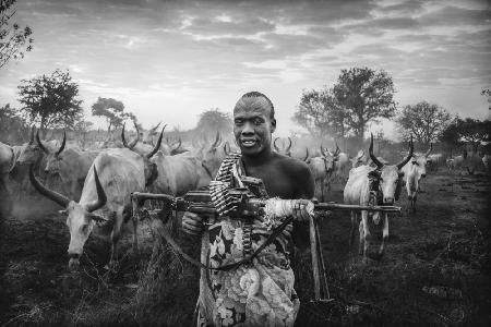 An armed man of the Mundari tribe