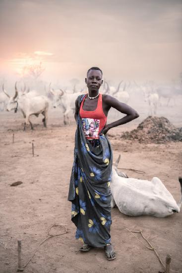 Mundari herds woman