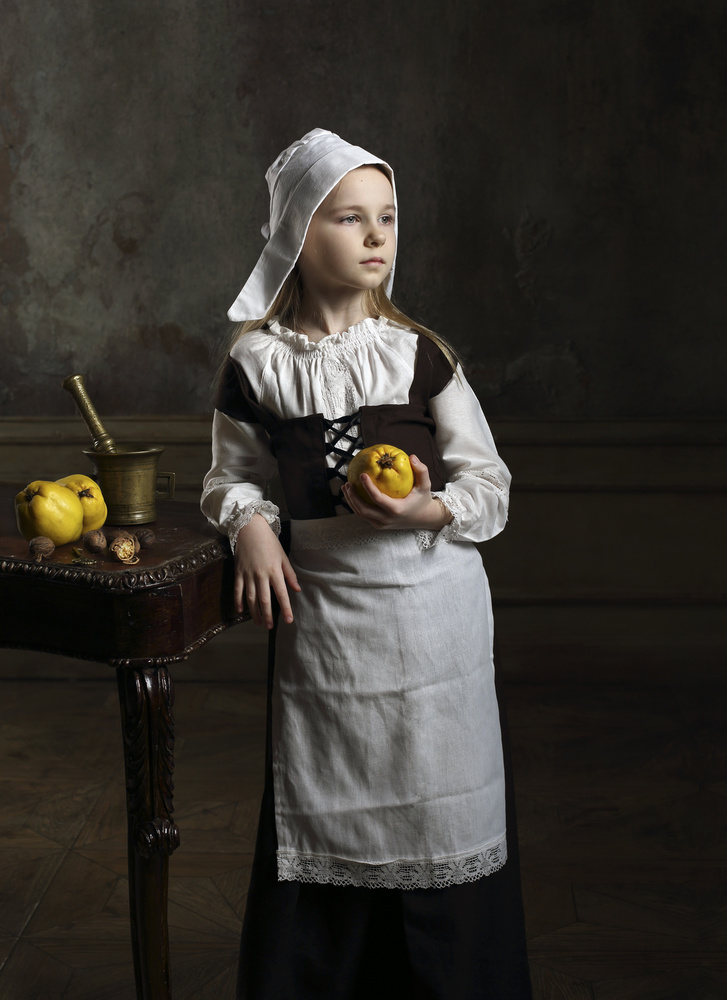 A young girl with some quinces von Victoria Glinka